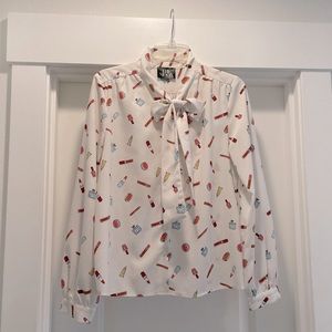 Cosmetic Print Tie Front Blouse